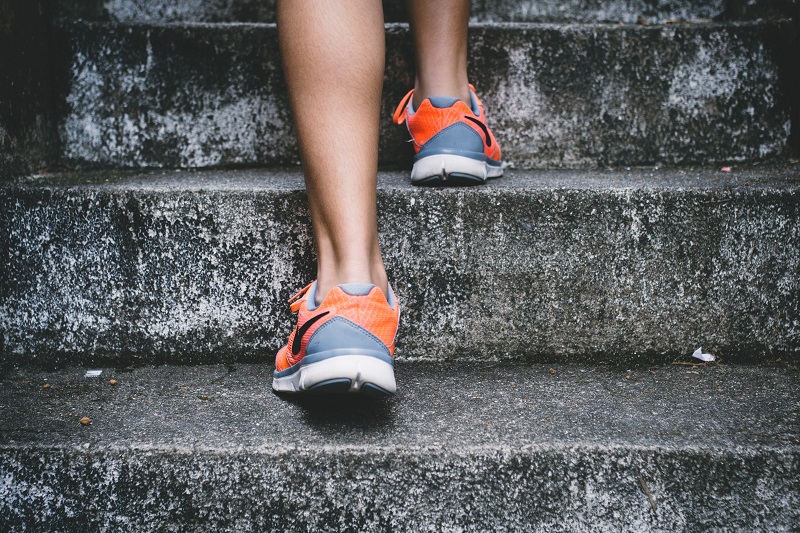 woman exercising in Nike shoes