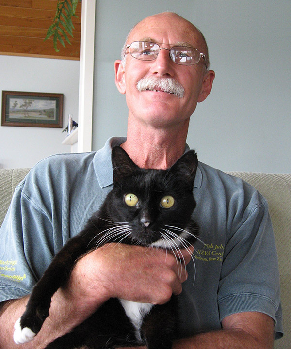 Jim Grayson with Mossie (cat)